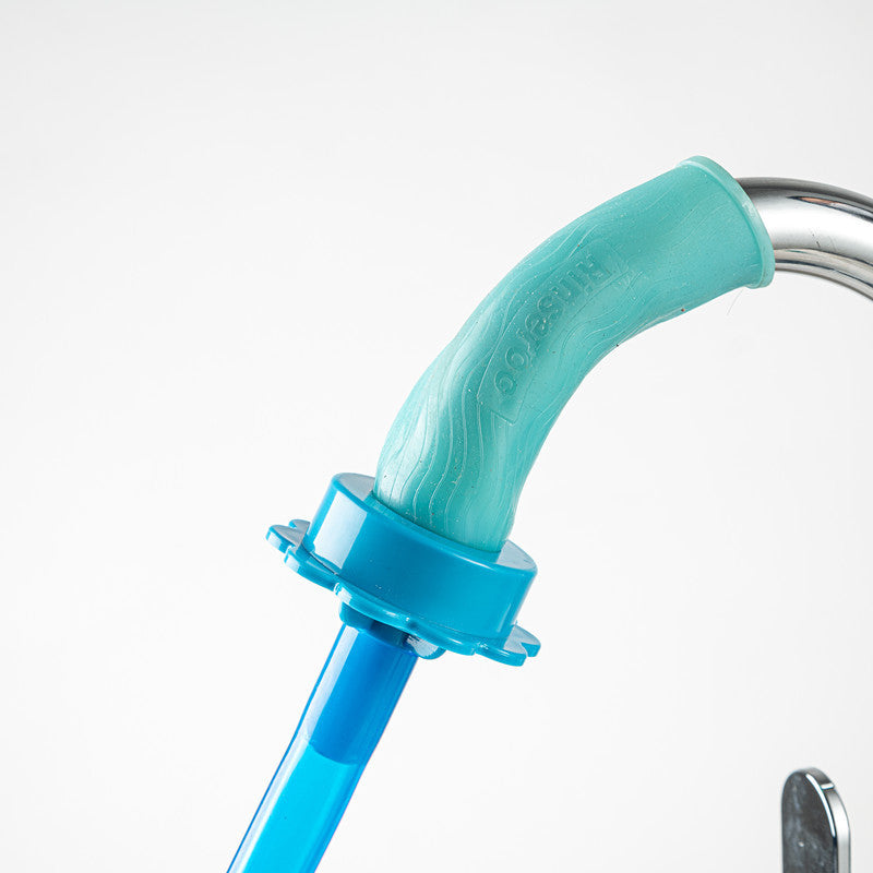 Pet shower hose connected to a kitchen faucet for washing small pets